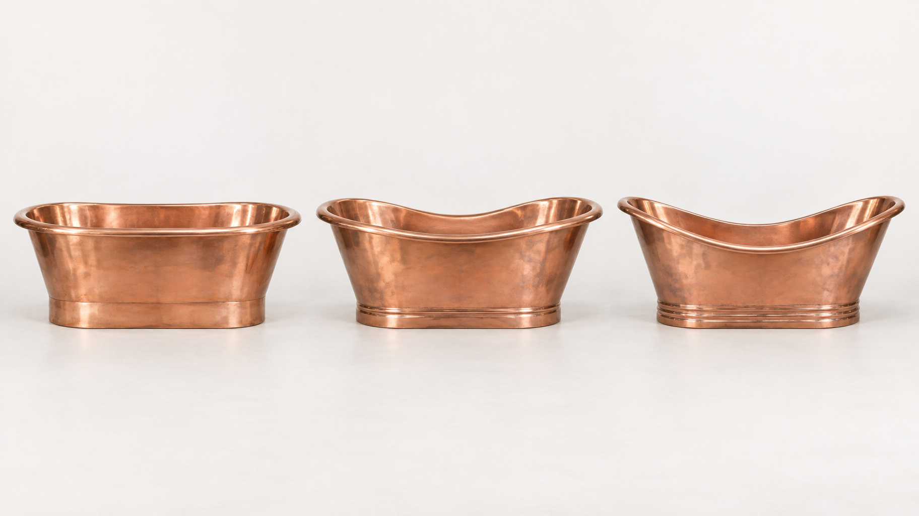 Three copper bathtub forms shown side by side